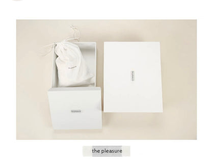 the pleasure. original design soft carved creamy white leather hand chain bag
